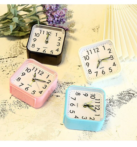 Quartz alarm clock with - alarm,